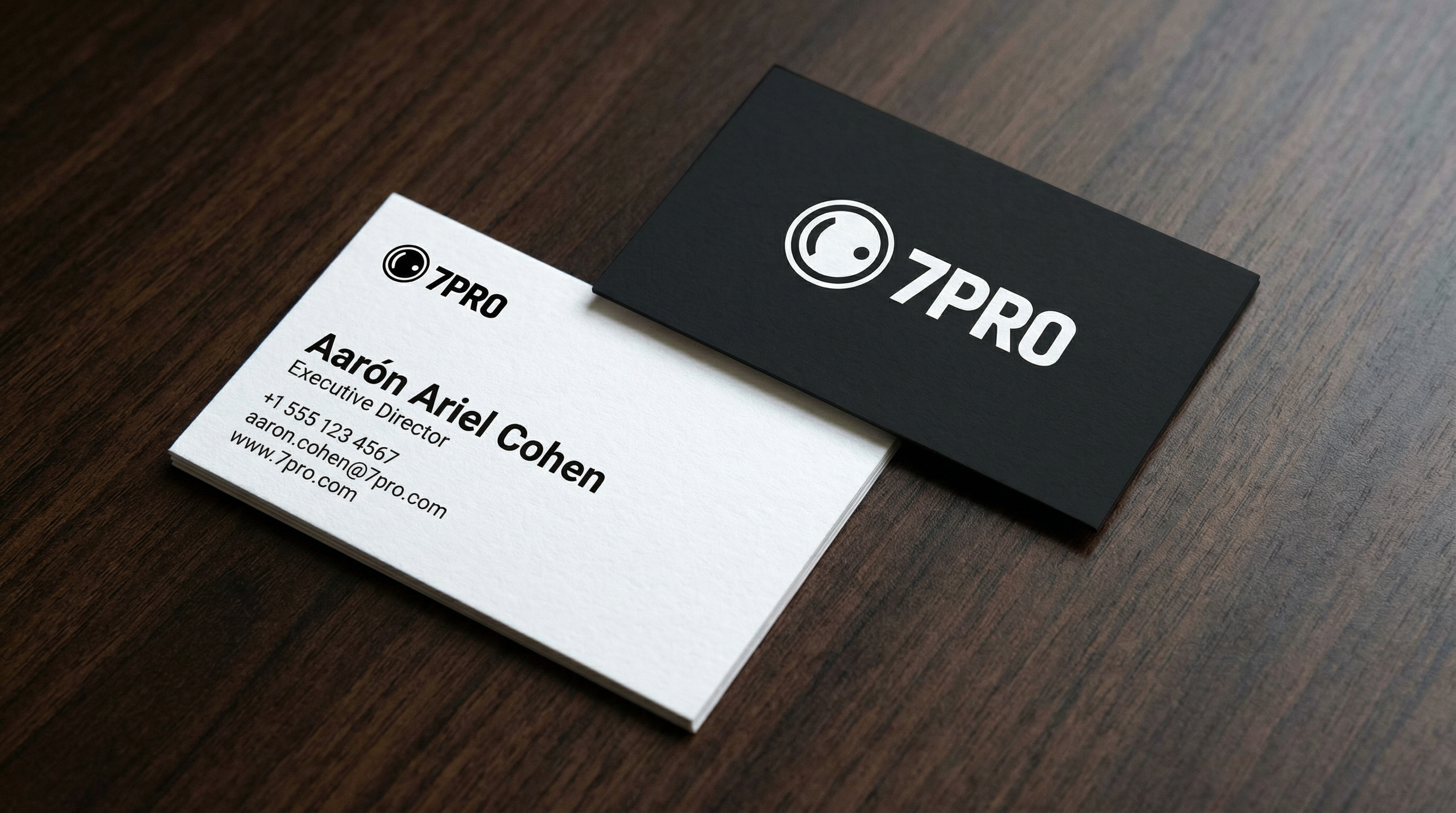 7PRO LLC business cards for Aarón Ariel Cohen, Executive Director, featuring front and back design with contact information and logo